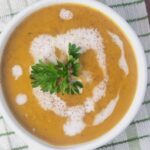 Overhead view of a kidney-friendly, low sodium butternut squash soup