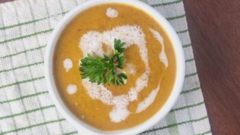 Overhead view of a kidney-friendly, low sodium butternut squash soup